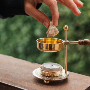 Incense burner with a candle